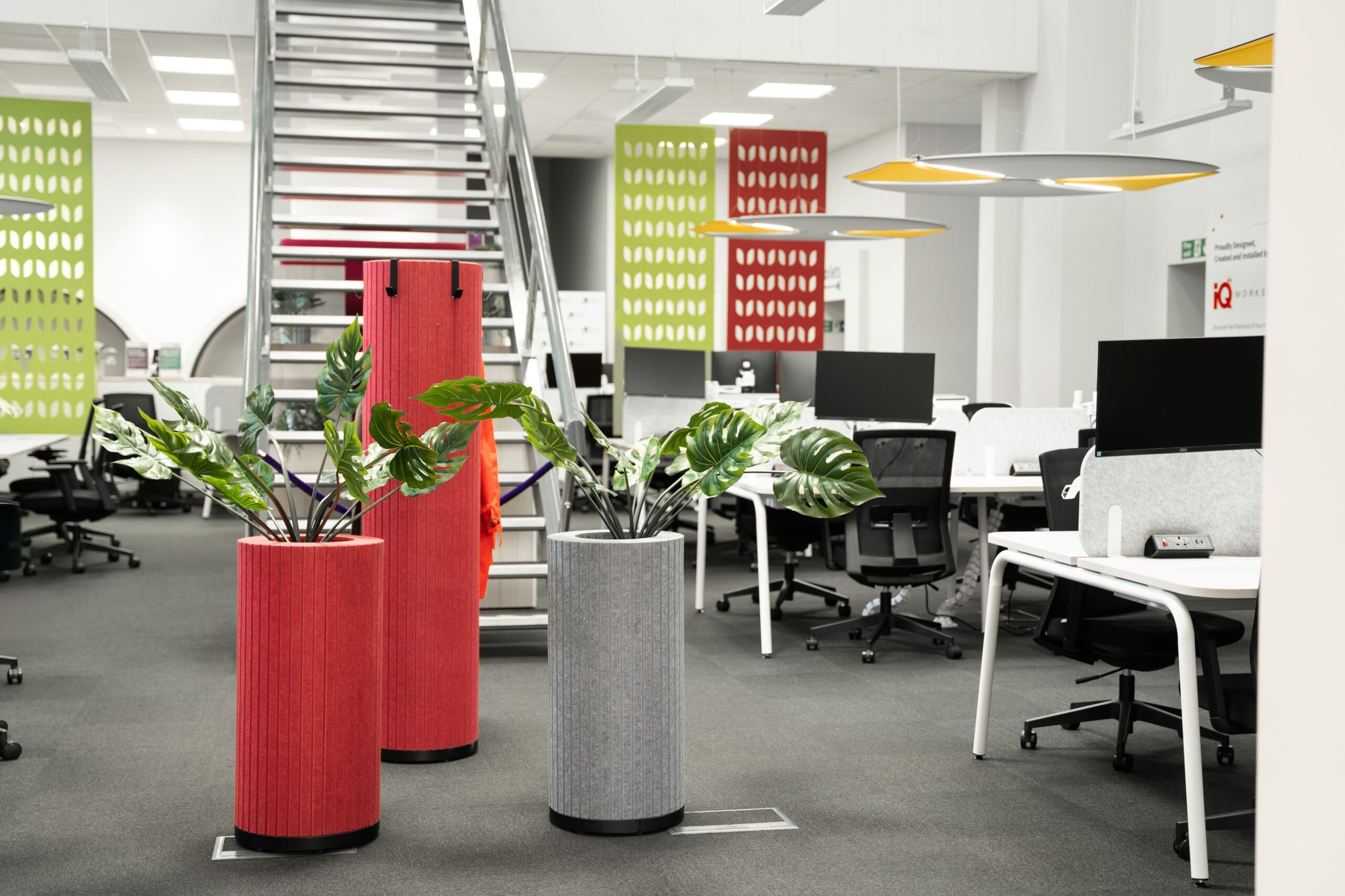 An image of desks, chairs, monitors, Parthos acoustic columns in Norfolk Chambers of Commerce's Business Hub